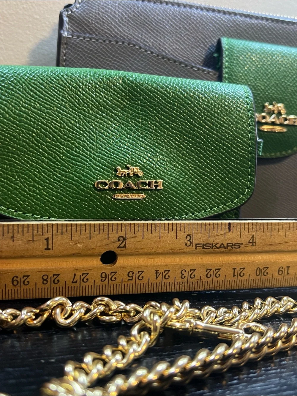 Coach Poppy Crossbody Bag set in a colorblock stone and kelly green